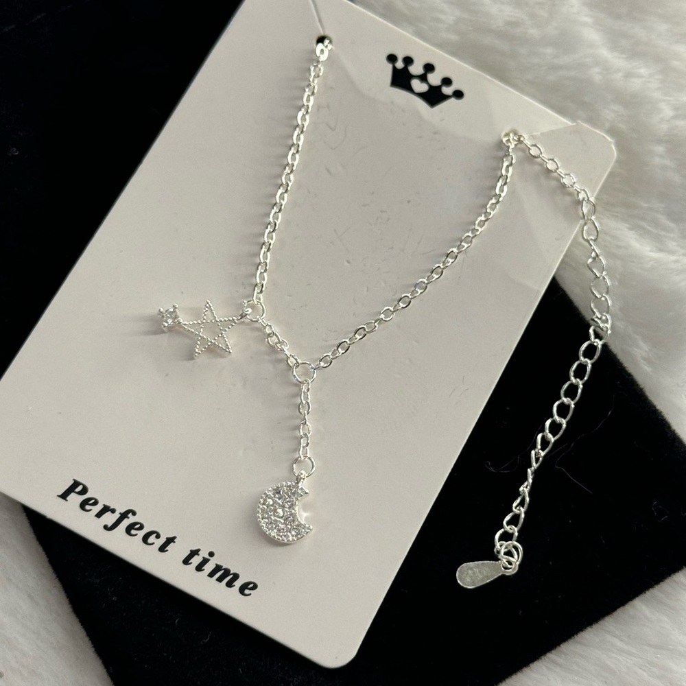 Silver Star and Moon Necklace